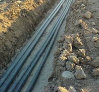 Прокладка кабеля под землей